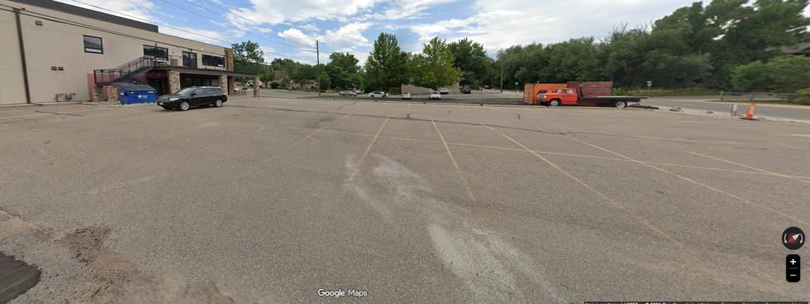 View from the ICG parking area toward neighboring buildings